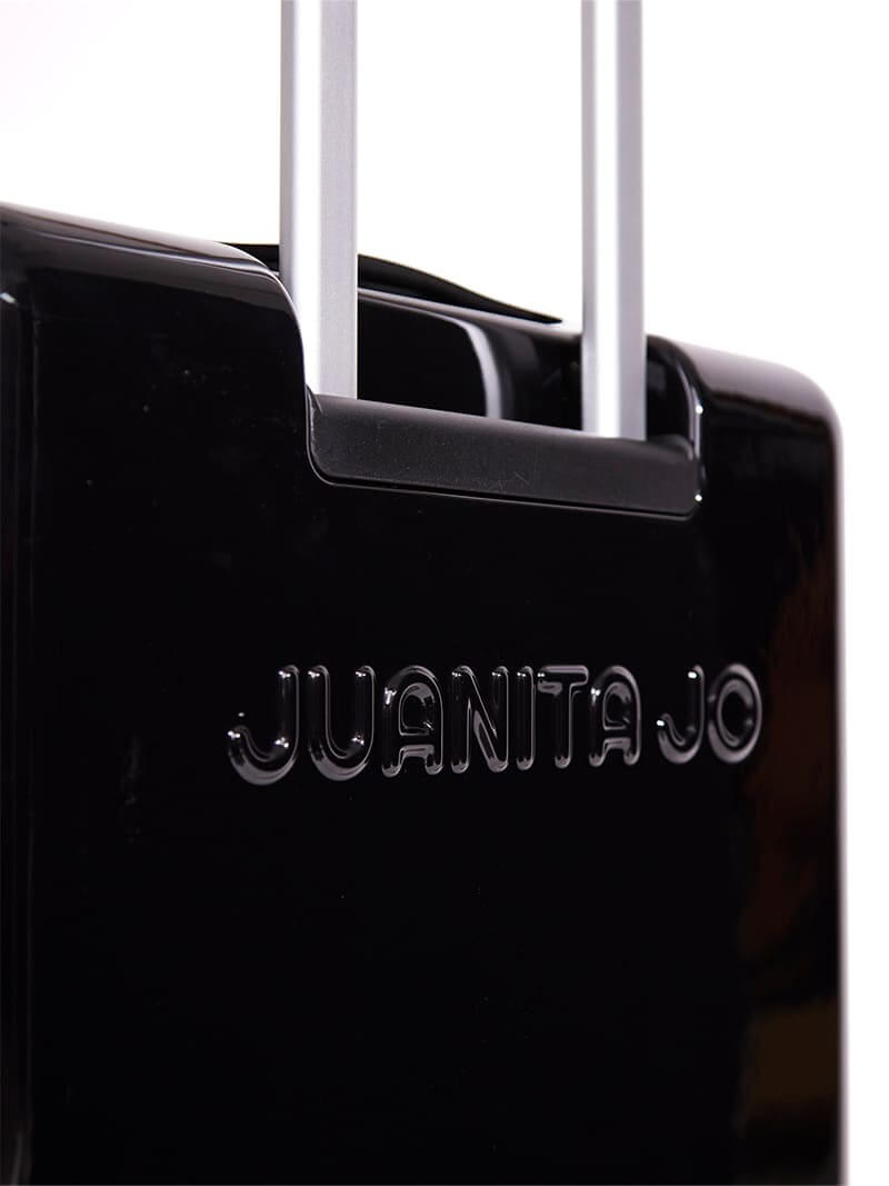 Valija negra de 23 kilos + Kit sueños de regalo