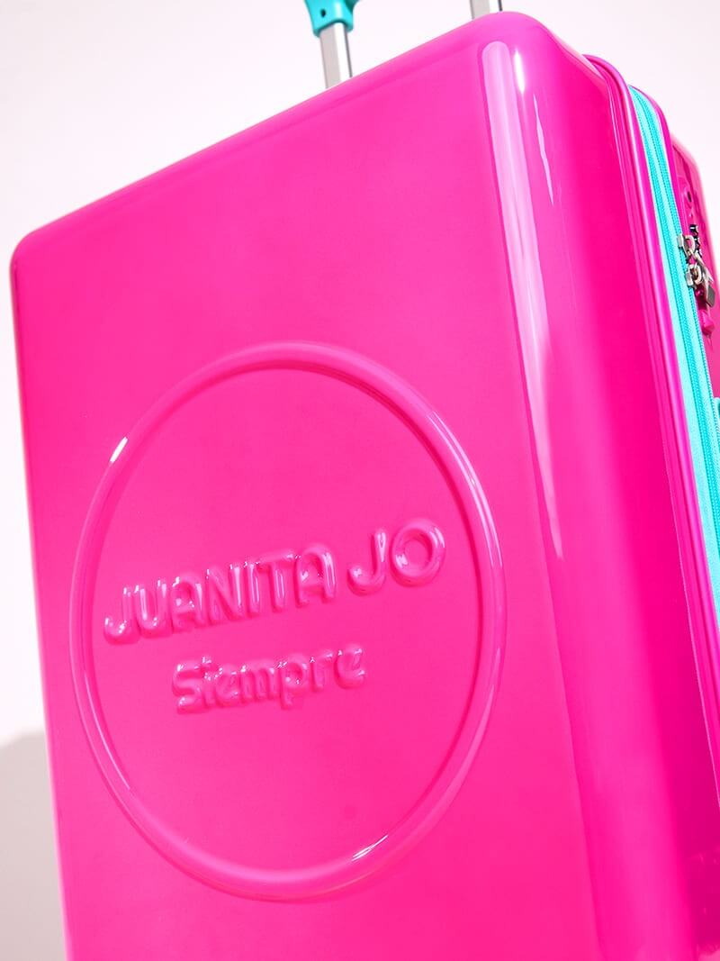 Valija fucsia de 23 kilos