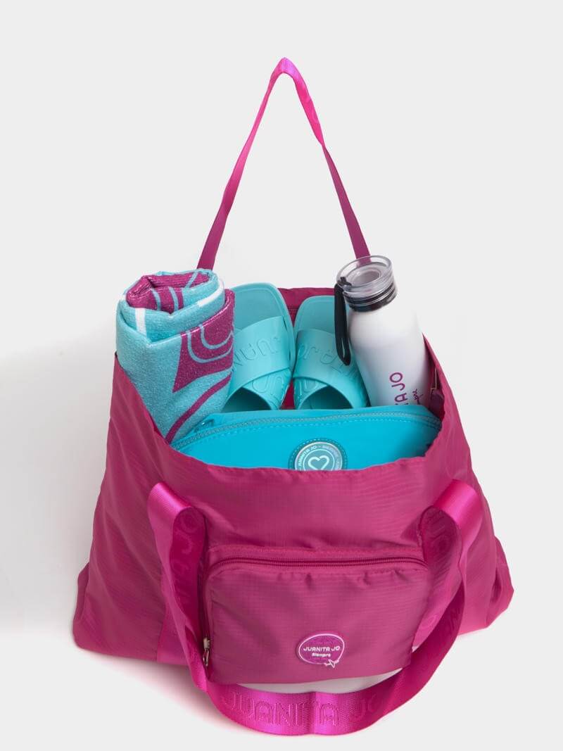 Cartera plegable para viaje fucsia Minimax