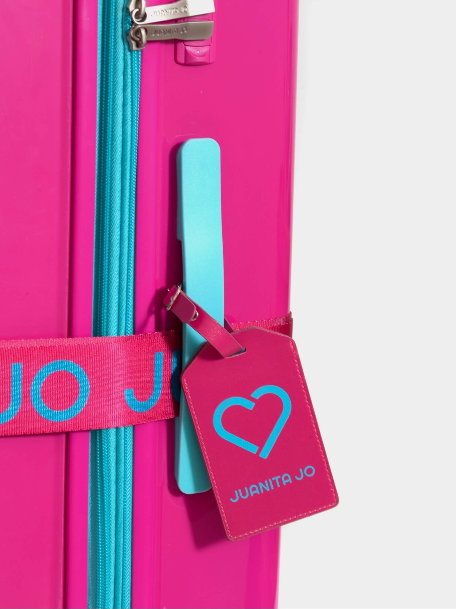 Kit de viaje para valija fucsia