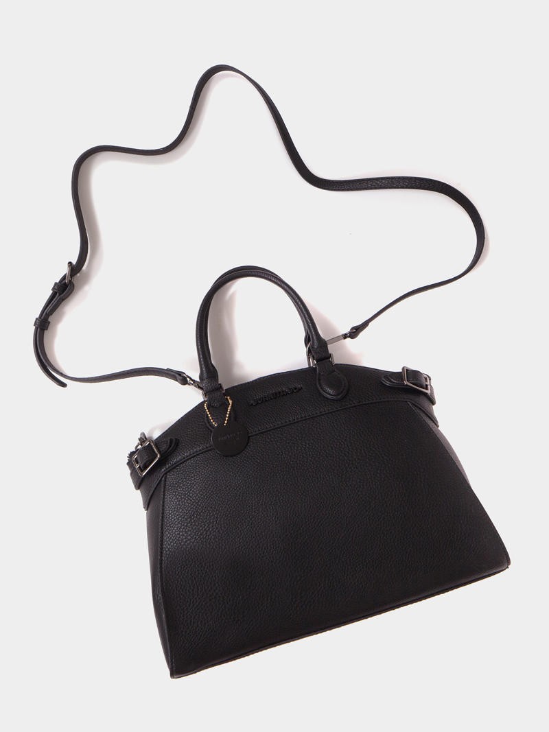 Cartera de mano negra Dallas