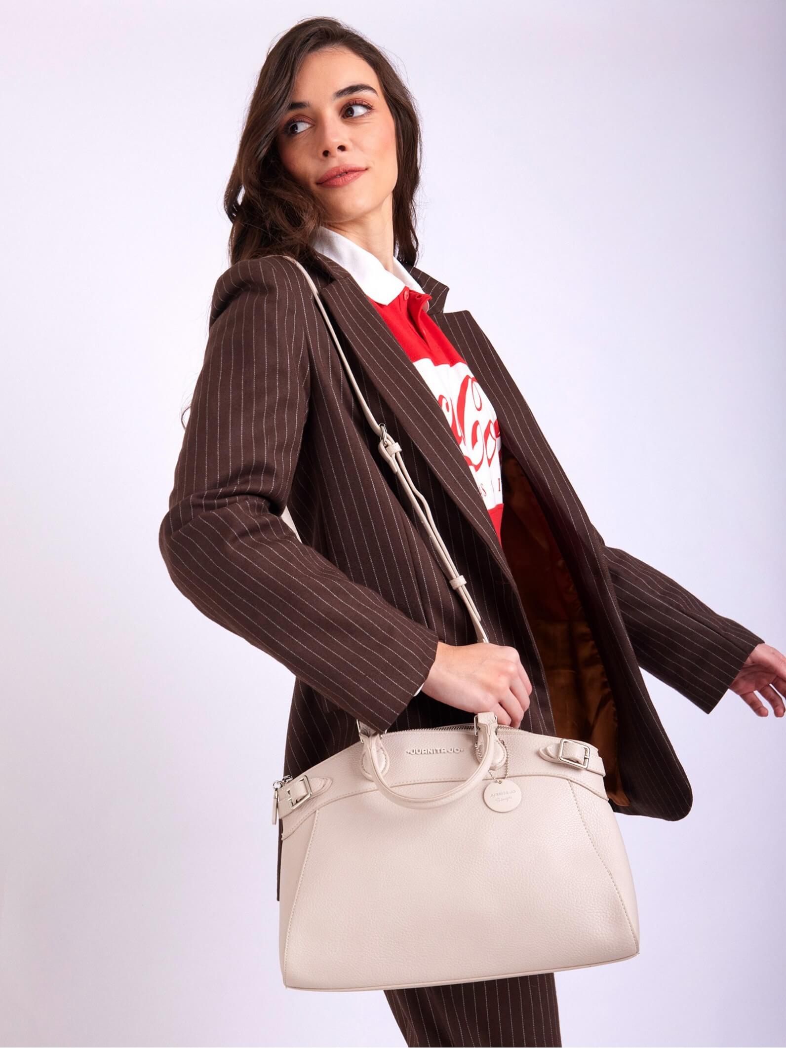 Cartera de mano nude Dallas