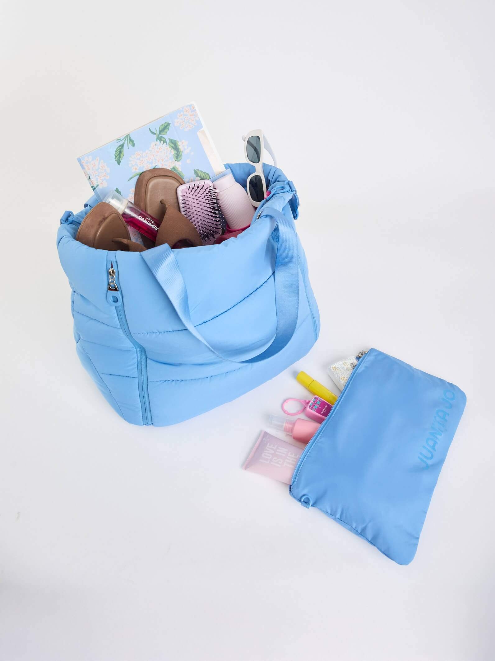 Cartera puffer azul Caro