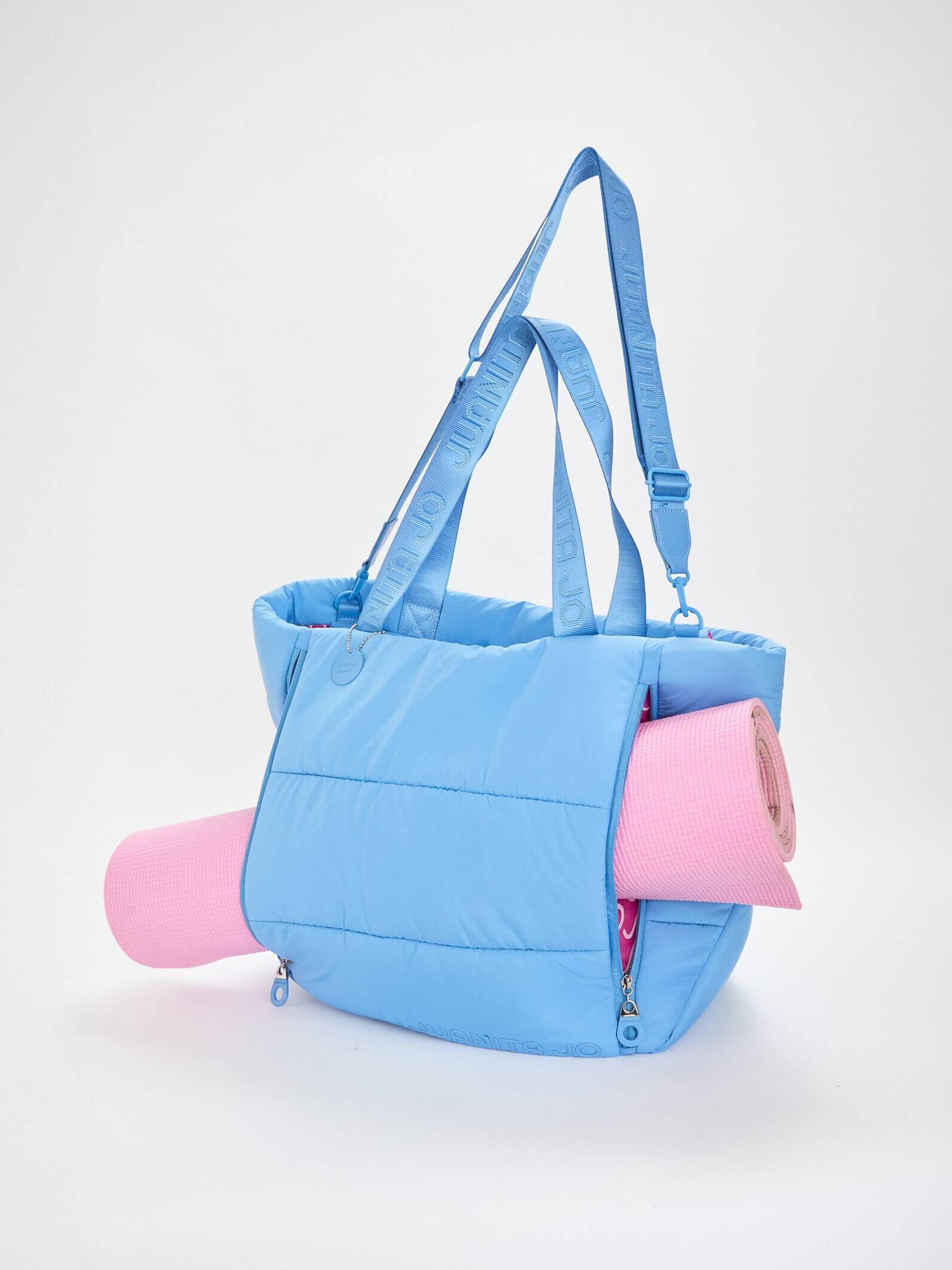 Cartera puffer azul Caro