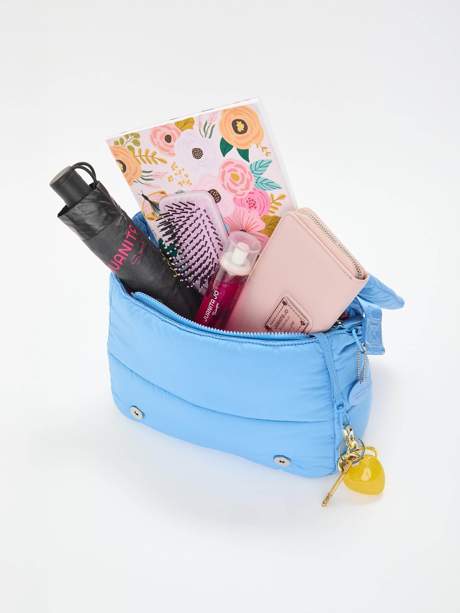 Bandolera puffer azul Caro