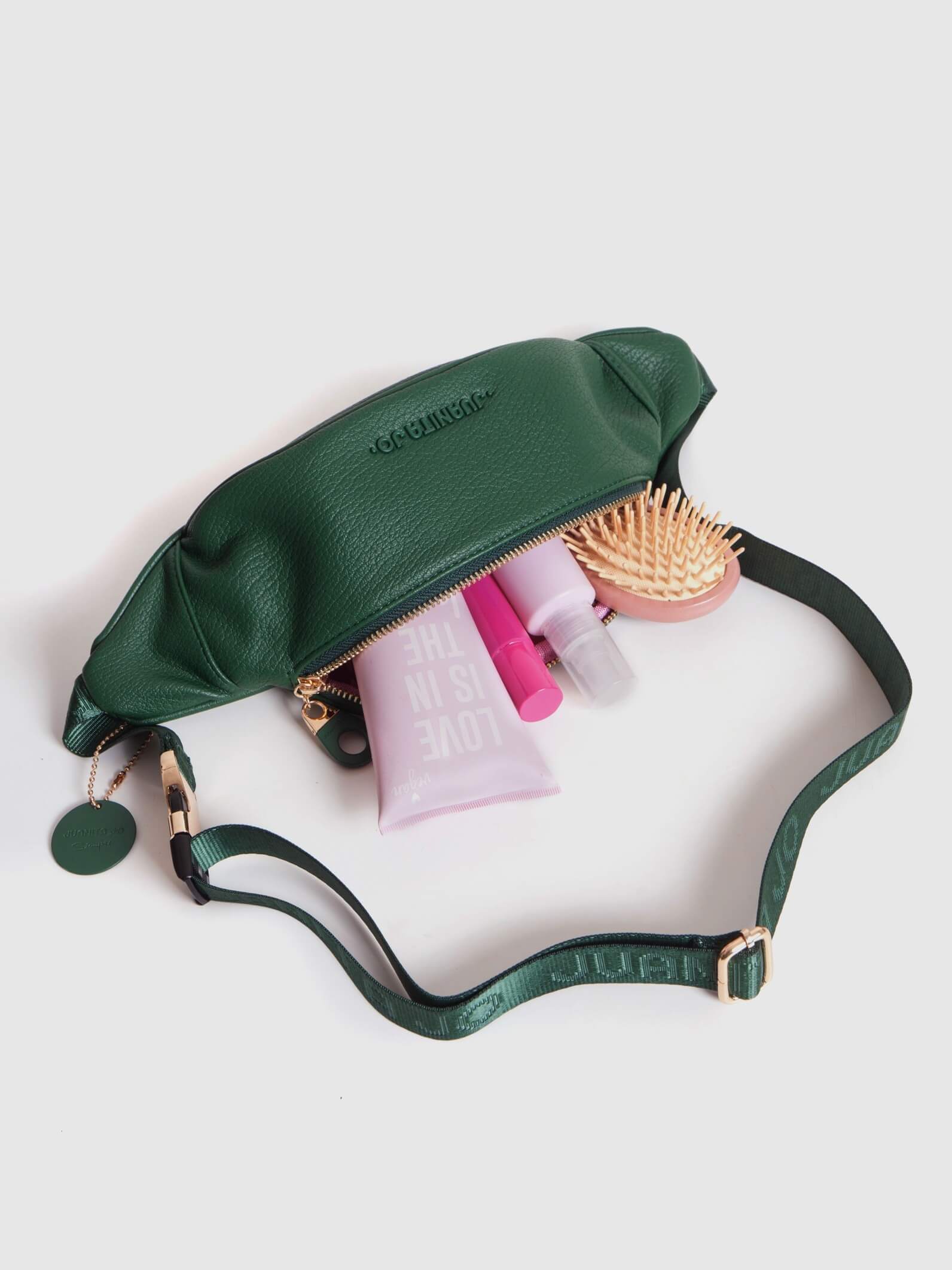 Riñonera Verde Revel con bolsillo antirrobo