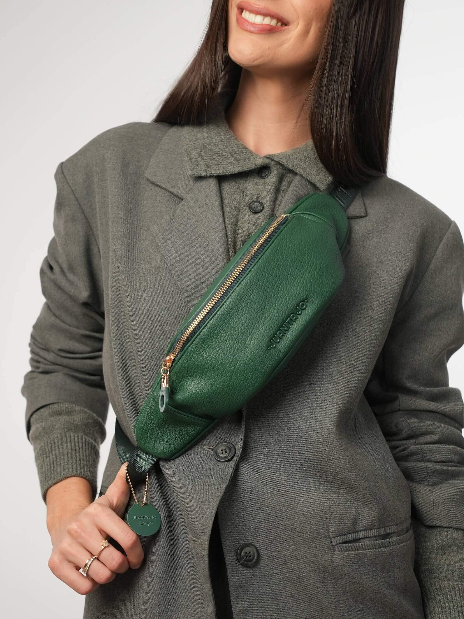 Riñonera Verde Revel con bolsillo antirrobo